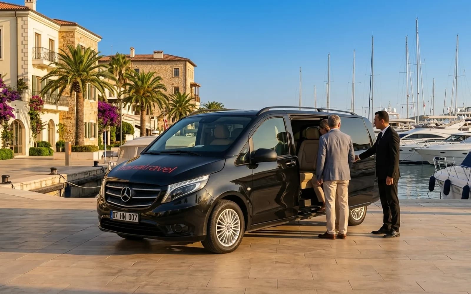 Leather seats, Wi-Fi, room to breathe Couple stepping into the black Hana Travel VIP Vito on a sunny marina promenade with white yachts — Antalya VIP transfer